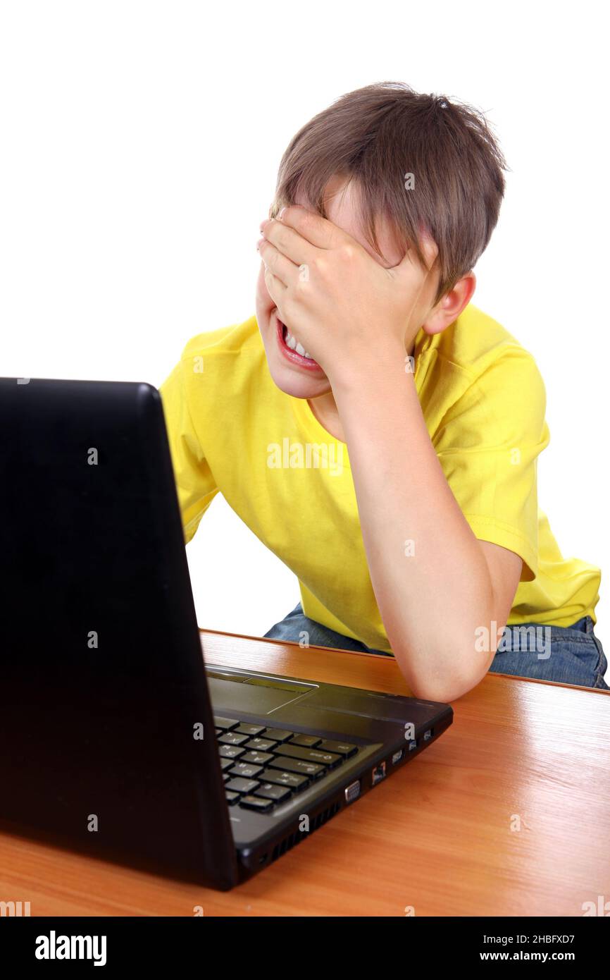 Kid Crying At Computer Sad Kid weeps behind Laptop Isolated on the White Background Stock ...