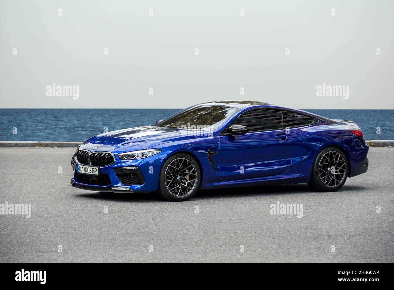 Kiev, Ukraine - June 19, 2021: Fast car BMW M8 on the road, against the ...