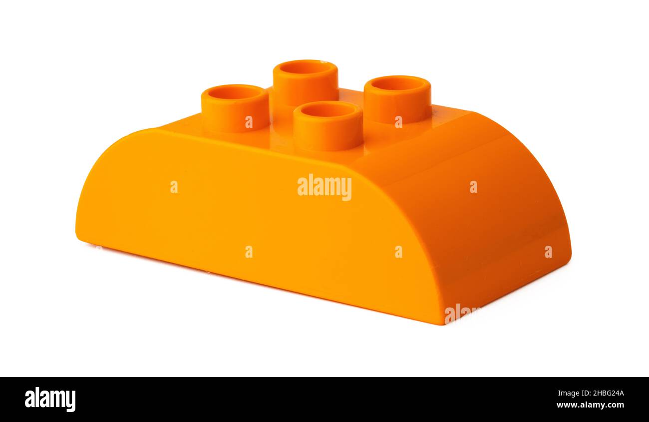 Orange plastic building blocks isolated on white Stock Photo