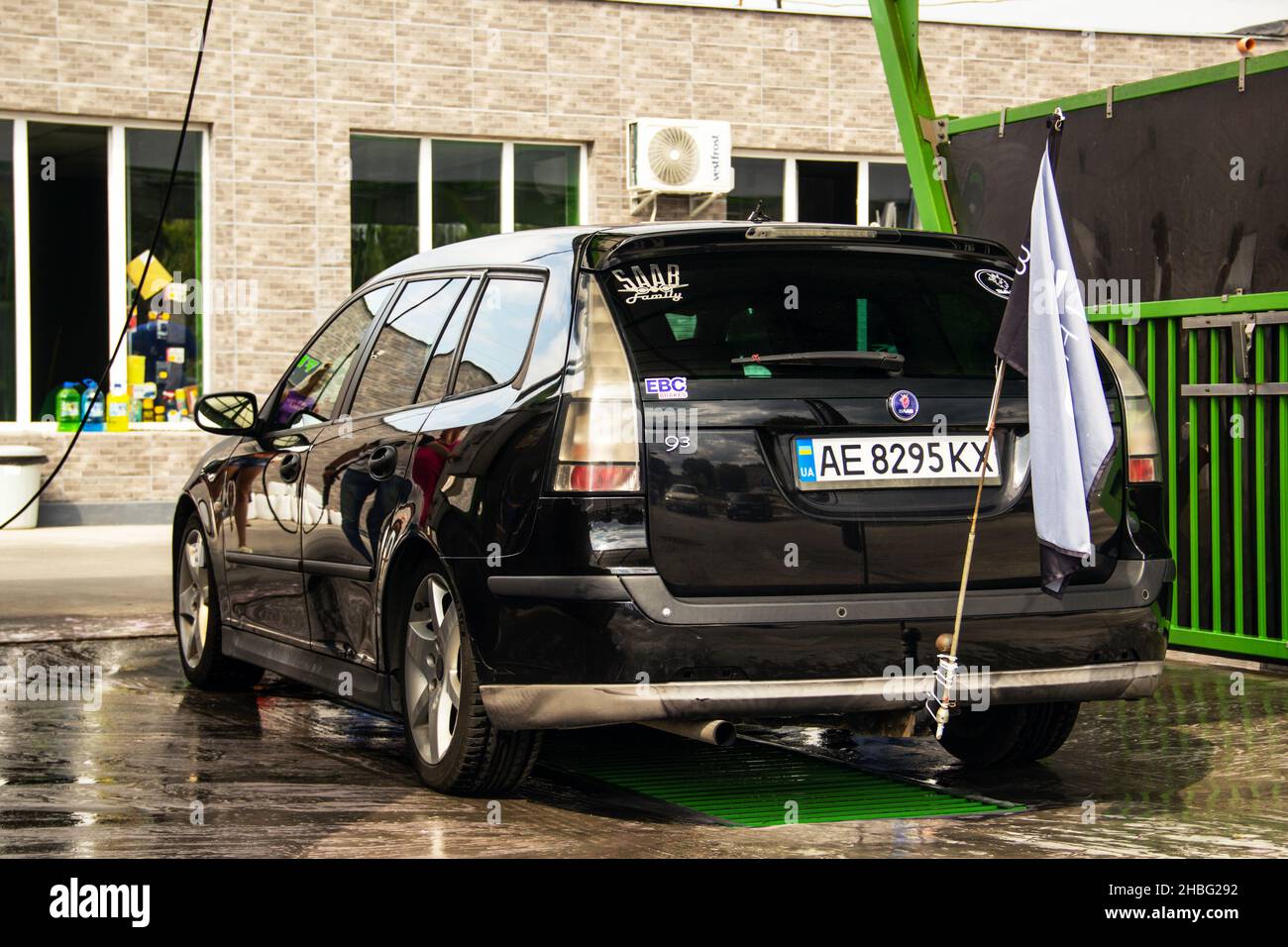 Chernigov, Ukraine - July 24, 2021: Saab car at a car wash. Black Saab 9-3 Sport Combi at the self-service car wash Stock Photo