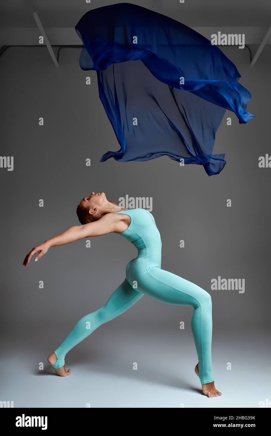 Ballerina Dancing with Silk Fabric, Modern Ballet Dancer in Fluttering