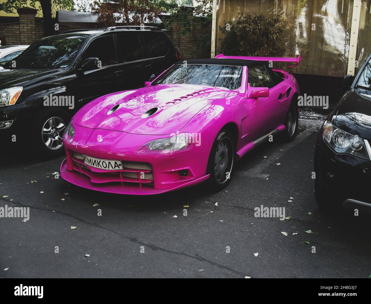 Kiev, Ukraine - September 25, 2010: Exclusive pink Mercedes-Benz SL Sbarro parked in the city Stock Photo