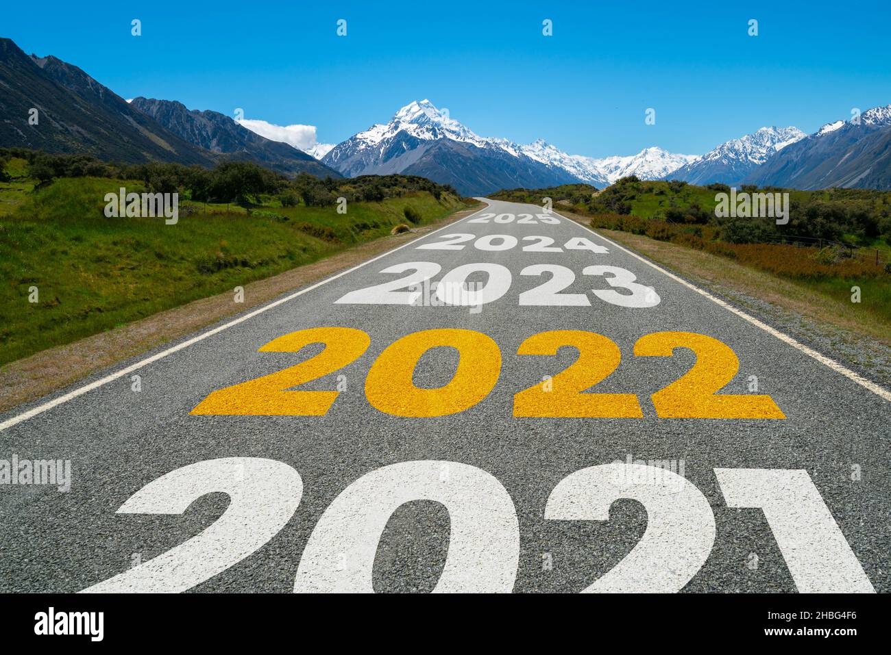 2022 New Year road trip travel and future vision concept . Nature landscape  with highway road leading forward to happy new year celebration in the  Stock Photo - Alamy