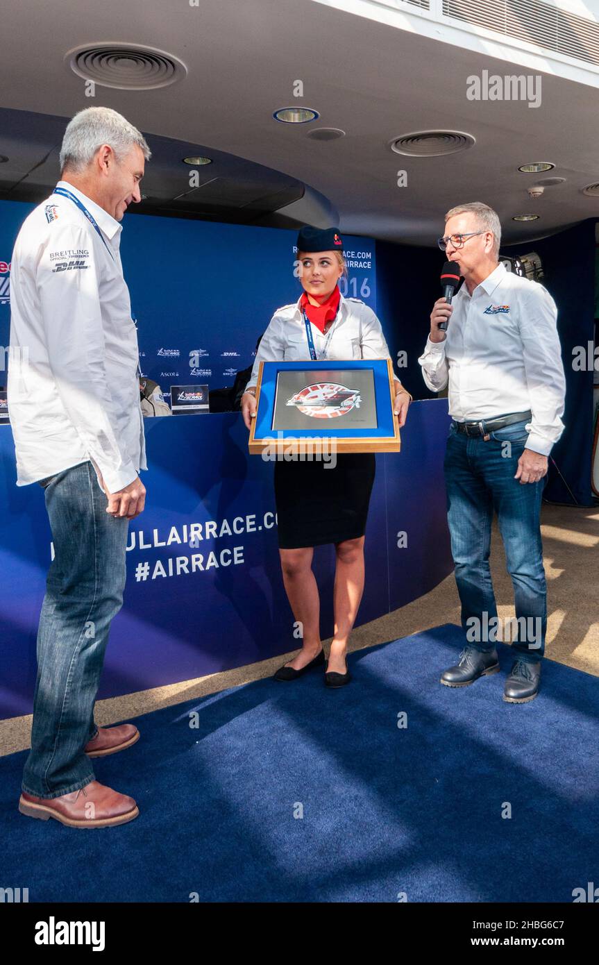 Pilot Paul Bonhomme presented with a commemorative gift from the Red Bull Air Race team following the racing at Royal Ascot racecourse Stock Photo