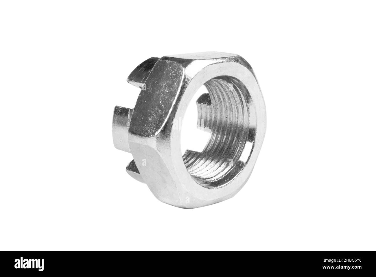 Macro shot metal nut isolated on white background. Chromed screw nut