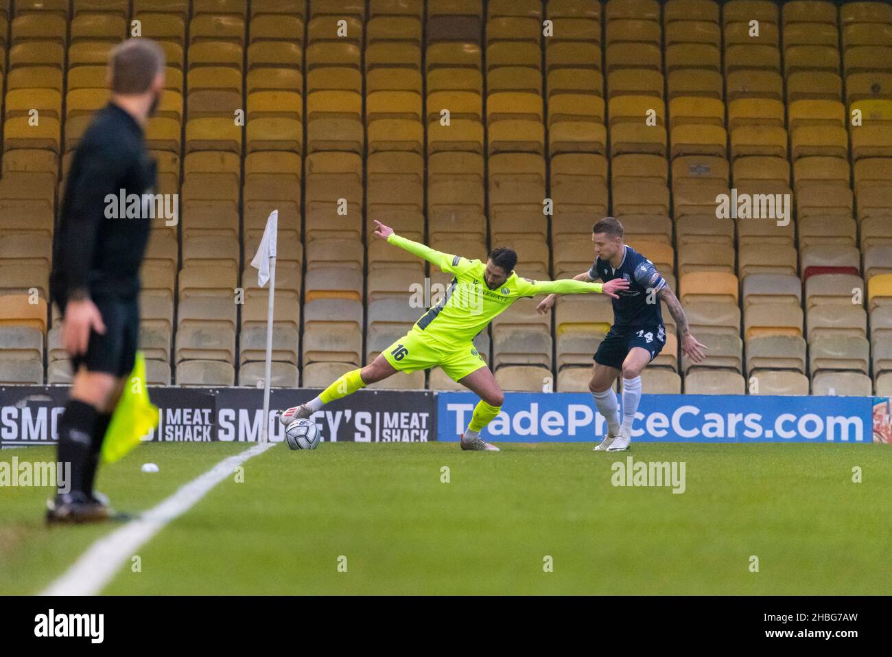 Nick Wheeler and Jason Demetriou playing in the FA Trophy 3rd round at Roots Hall, Southend United v Dorking Wanderers football match. Empty seats Stock Photo