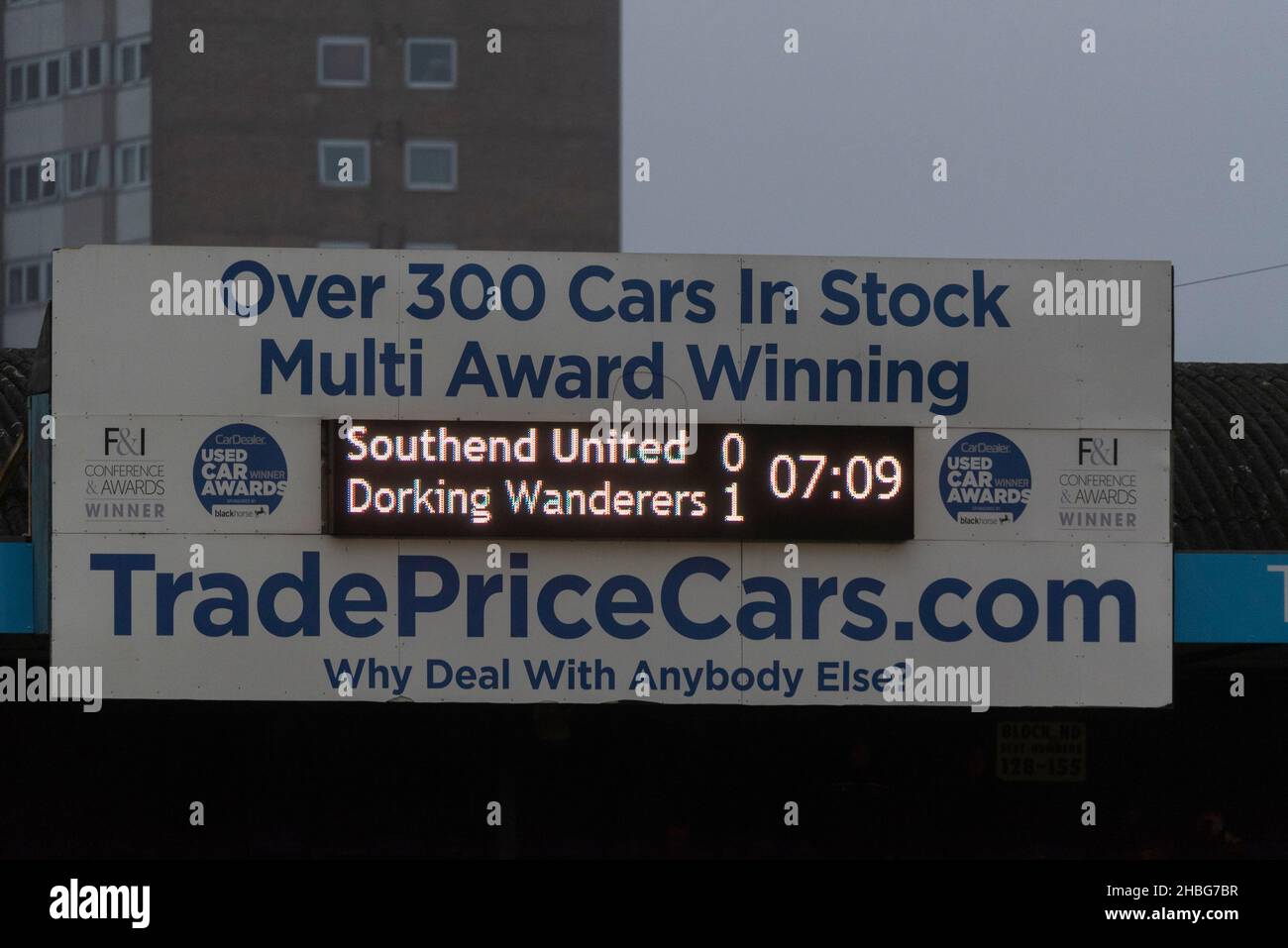 FA Trophy 3rd round at Roots Hall, Southend United v Dorking Wanderers football match on a grim, rainy cold winter day. Digital scoreboard, goal down Stock Photo