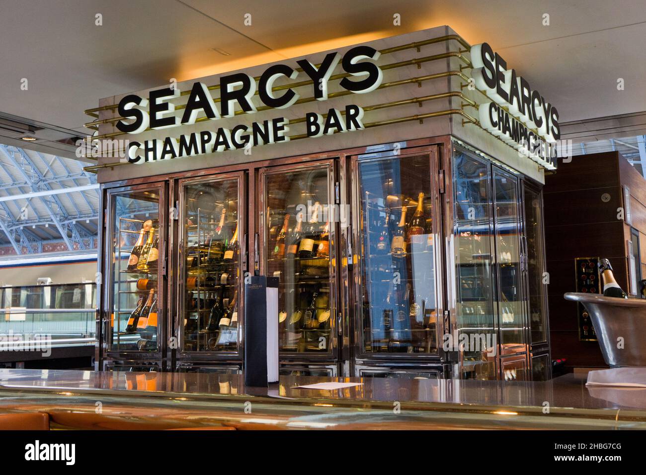 Interior of St Pancras International railway station, London, UK; view of Searcys Champagne Bar Stock Photo
