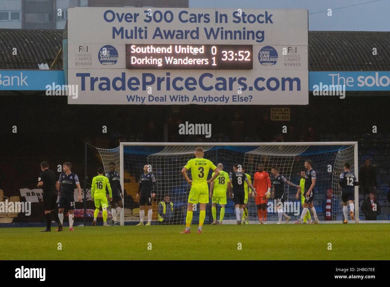 FA Trophy 3rd round at Roots Hall, Southend United v Dorking Wanderers football match on a grim, raining, misty evening. Scoreboard. Southend losing Stock Photo
