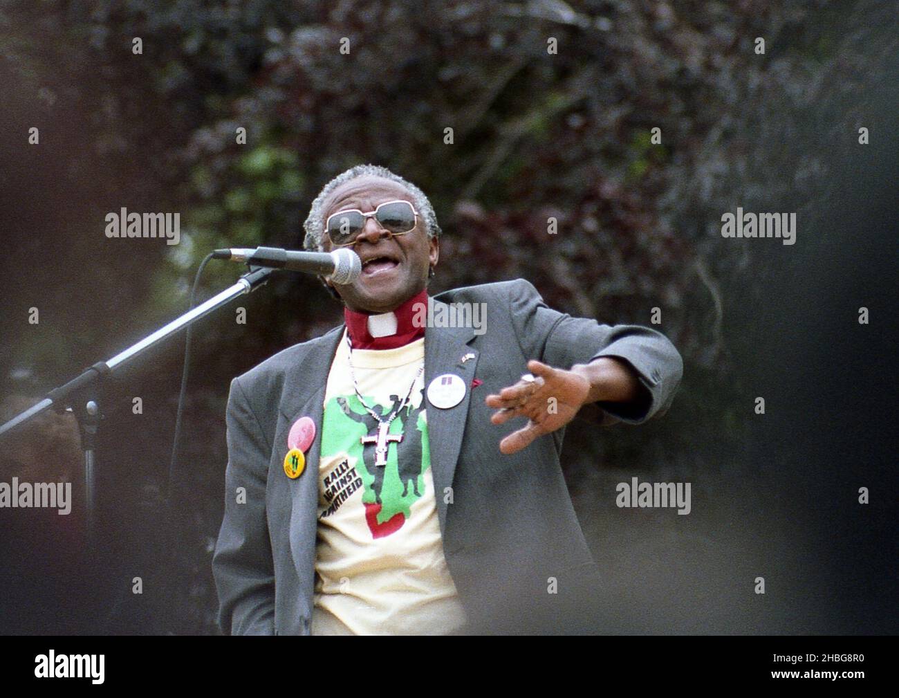 On 31st May 1986, the then Bishop Desmond Tutu addressed a crowd in Queens Park, Toronto after a march of about 10,000 people as part of the Toronto Arts Against Apartheid Festival Foundation. He arrived in Canada  two years after he received the Nobel Prize for Peace. Stock Photo