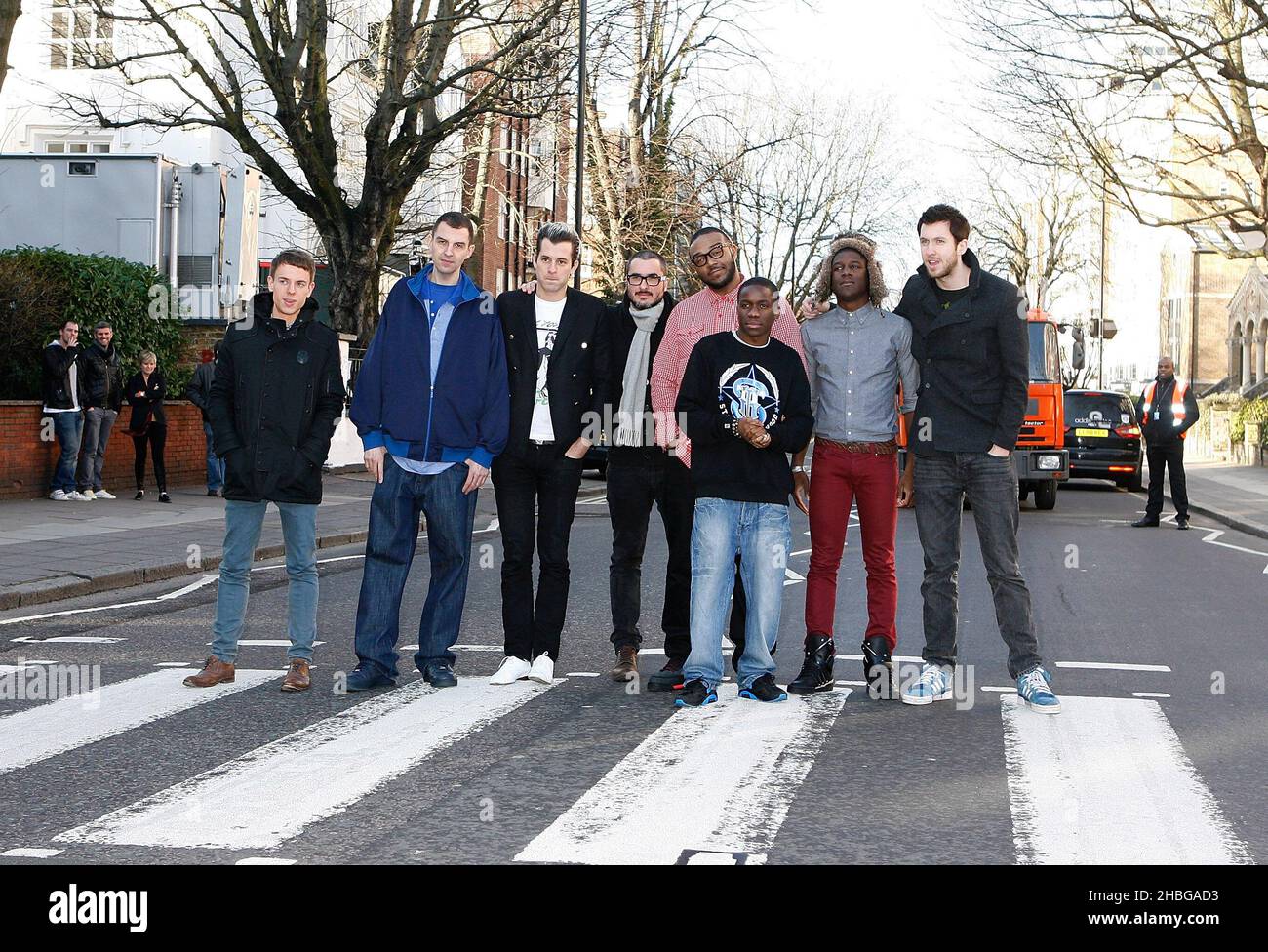 L-R) Jamie T, Tim Westwood, Mark Ronson, Zane Lowe, Mr Jam, Tinchy Stryder,  Labrinth and Calvin Harris pose on the Abbey Road zebra crossing as part of  the Developing Musicians Music Industry