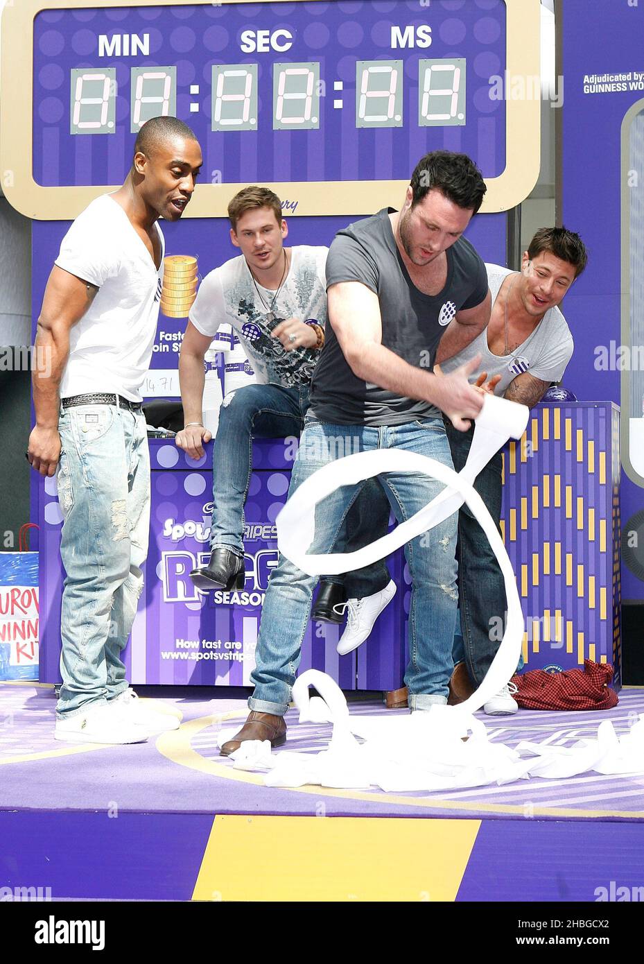 Antony Costa from boyband Blue competes to break a Guinness World Record  for the fastest toilet roller, as they attempt to unravel a toilet roll  live on stage. Event marks the Race