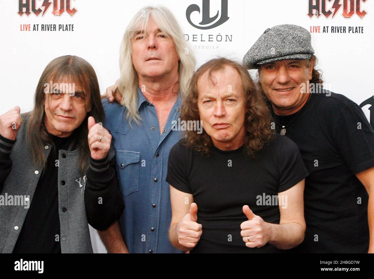 Malcolm Young, Cliff Williams, Angus Young, Brian Johnson of ACDC promote their new DVD Live at River Plate at the HMV Hammersmith Apollo in London. Stock Photo