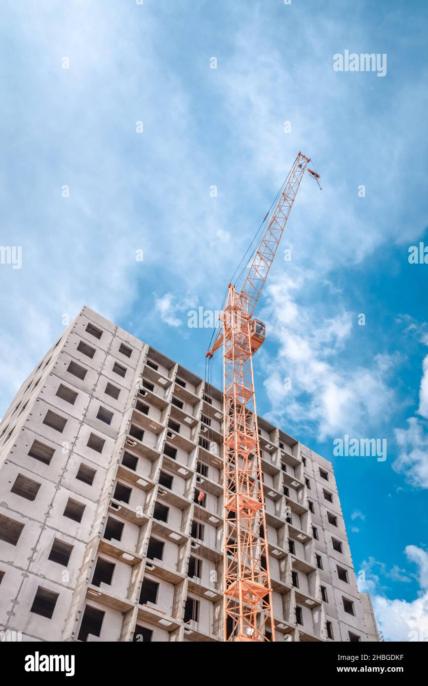 Building of new apartments and crane Stock Photo