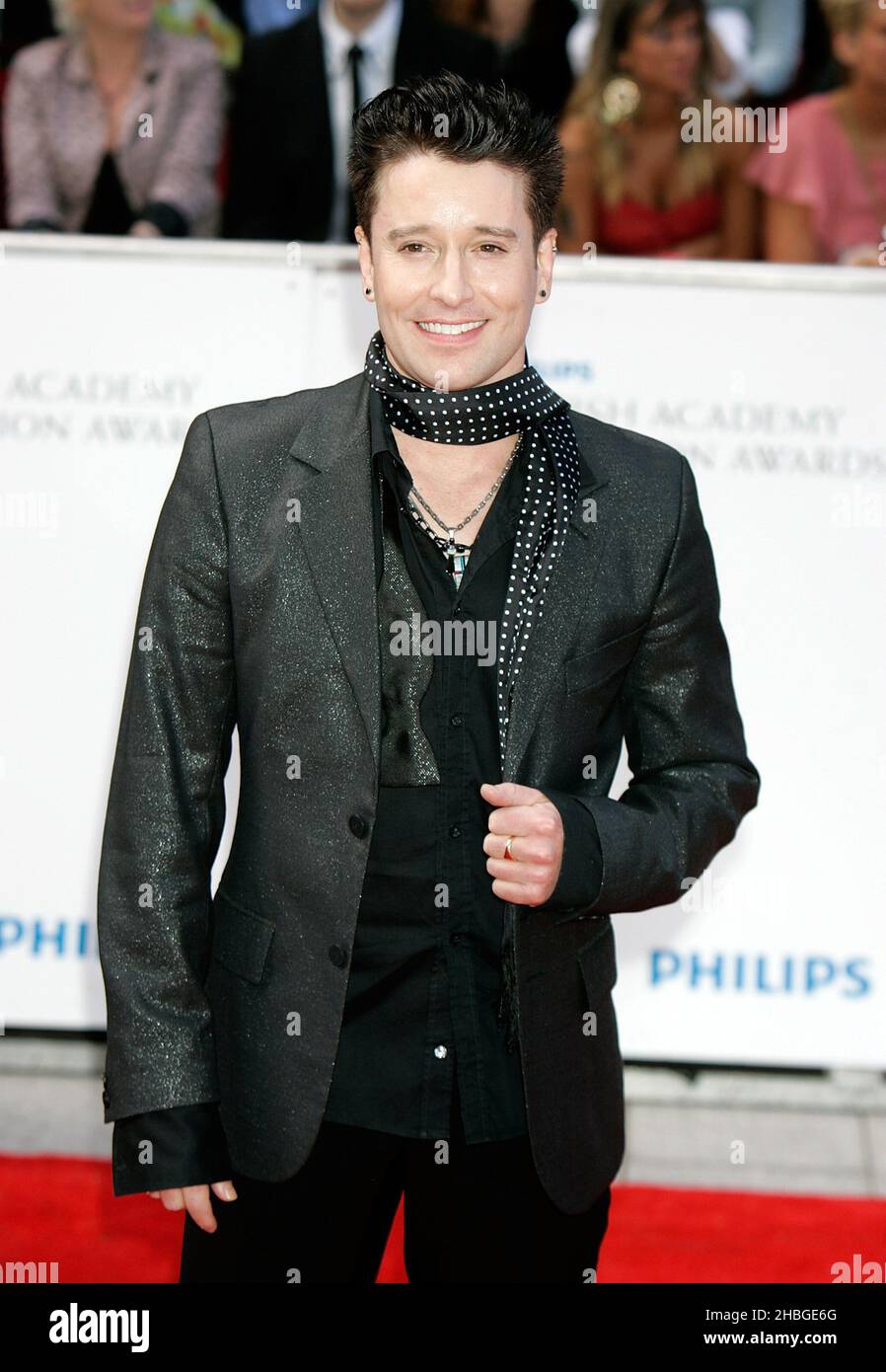 Andrew Stone arrives at the Phillips British Television Academy Awards