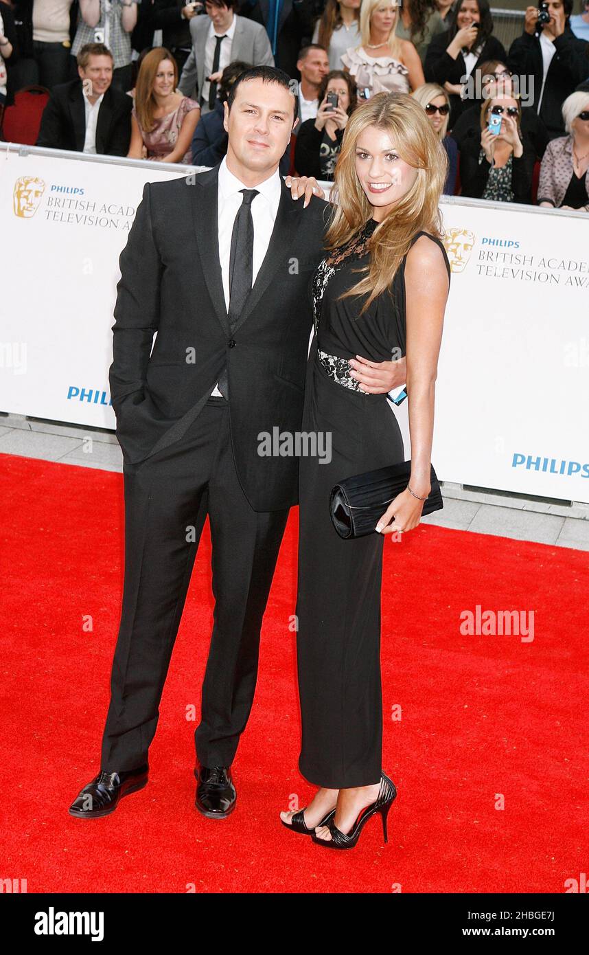 Paddy McGuinness and Christine Martin arrive at the Phillips British Television Academy Awards at the Grosvenor House Hotel on May 22, 2011. Stock Photo