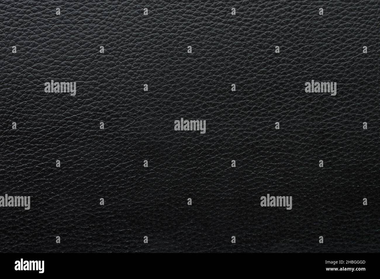 Black leather material surface macro close up view Stock Photo