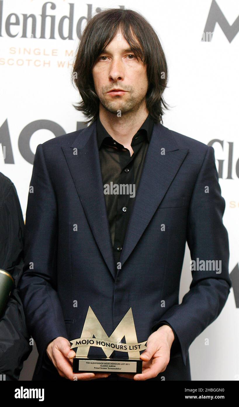 Bobby Gillespie of Primal Scream with award for Mojo Classic Album for 'Screamadelica' at the Mojo Awards at The Brewery in London. Stock Photo