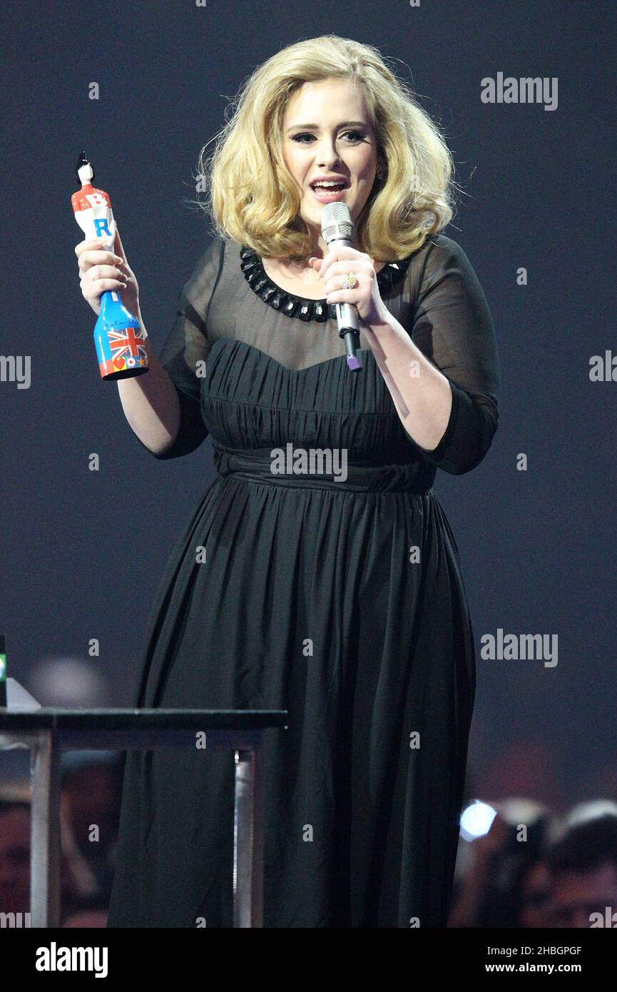 Adele accepts her award for best Female Solo Artist during the 2012