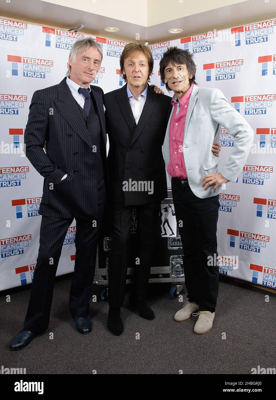 Paul Weller,Paul McCartney,Ronnie Wood backstage at the Teenage Cancer Trust at the Royal Albert Hall, London Stock Photo