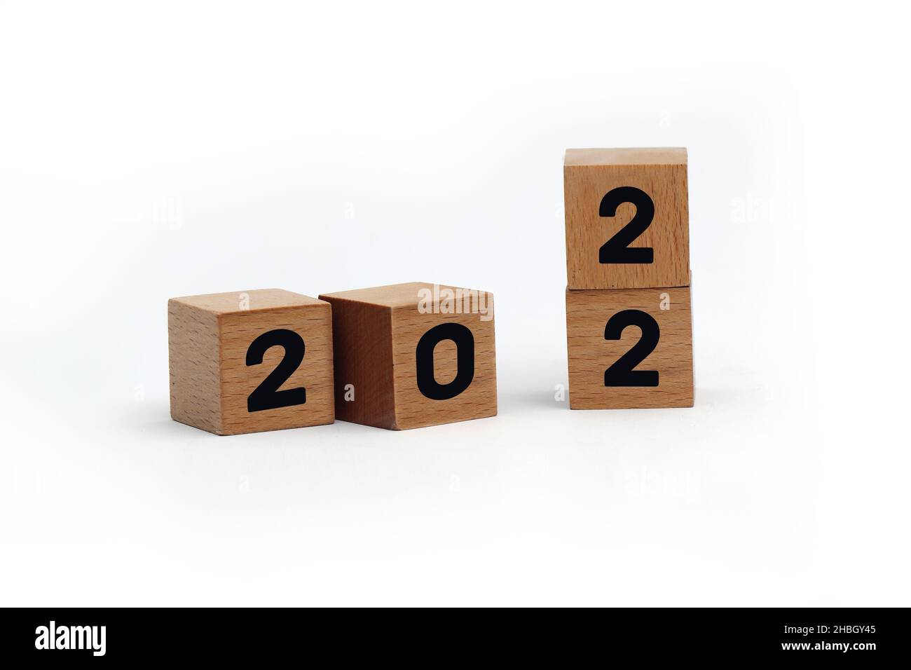 Happy New Year 2022, 3D wood cube block isolated and white background with copy space for text, greeting card, banner Stock Photo