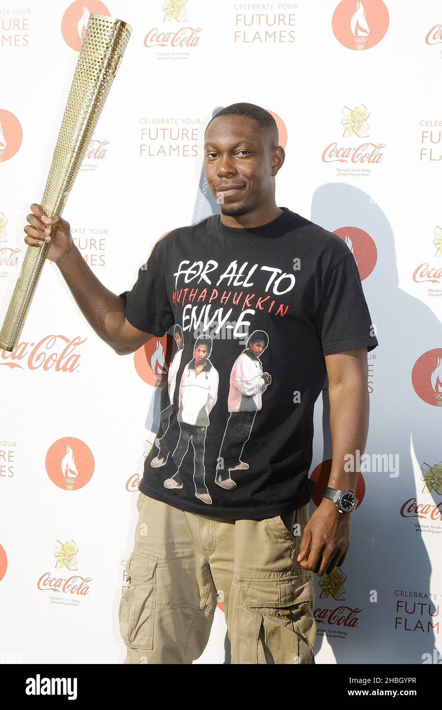 Dizzee Rascal 2012 Dizzee Rascal poses backstage with the Torch at Coca-Cola's London 2012 ...