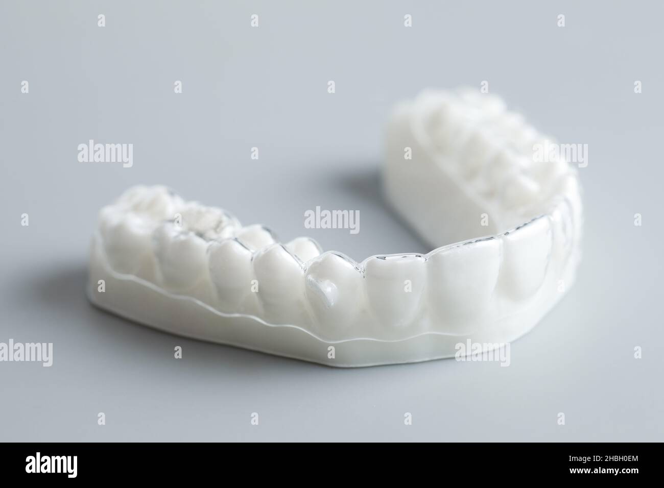Individual silicone tooth tray for whitening. Teeth whitening concept. Stock Photo