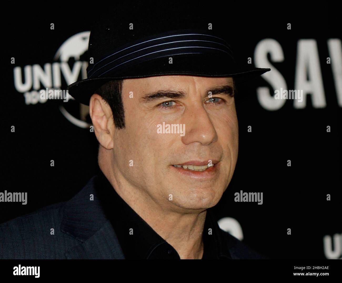 John Travolta seen at a Photocall for upcoming UK cinema release Savages at The Oriental Mandarin Hotel in London. Stock Photo
