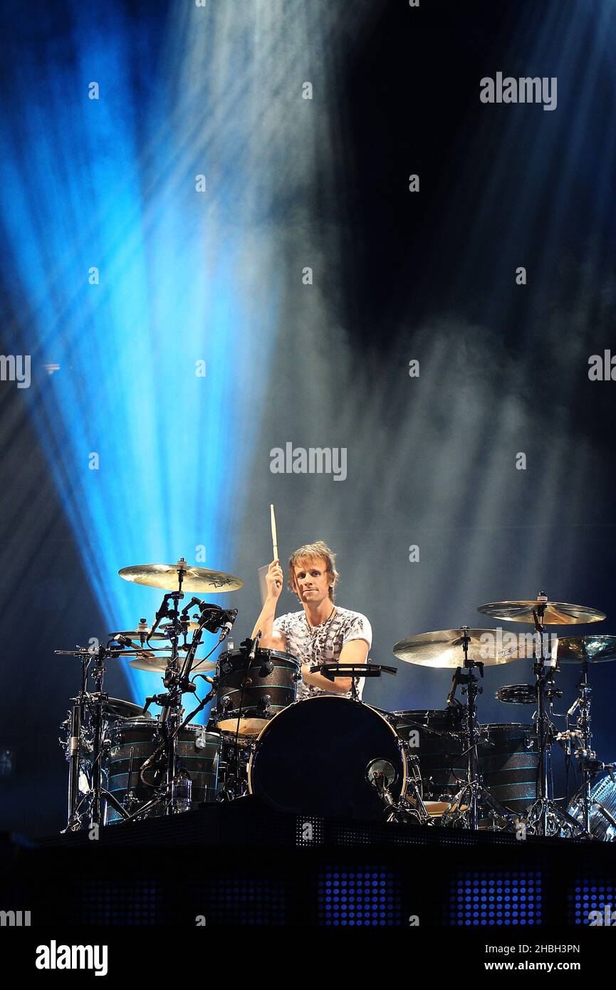 Dominic Howard Of Muse Performs On Stage At The 02 Arena In London Stock Photo Alamy