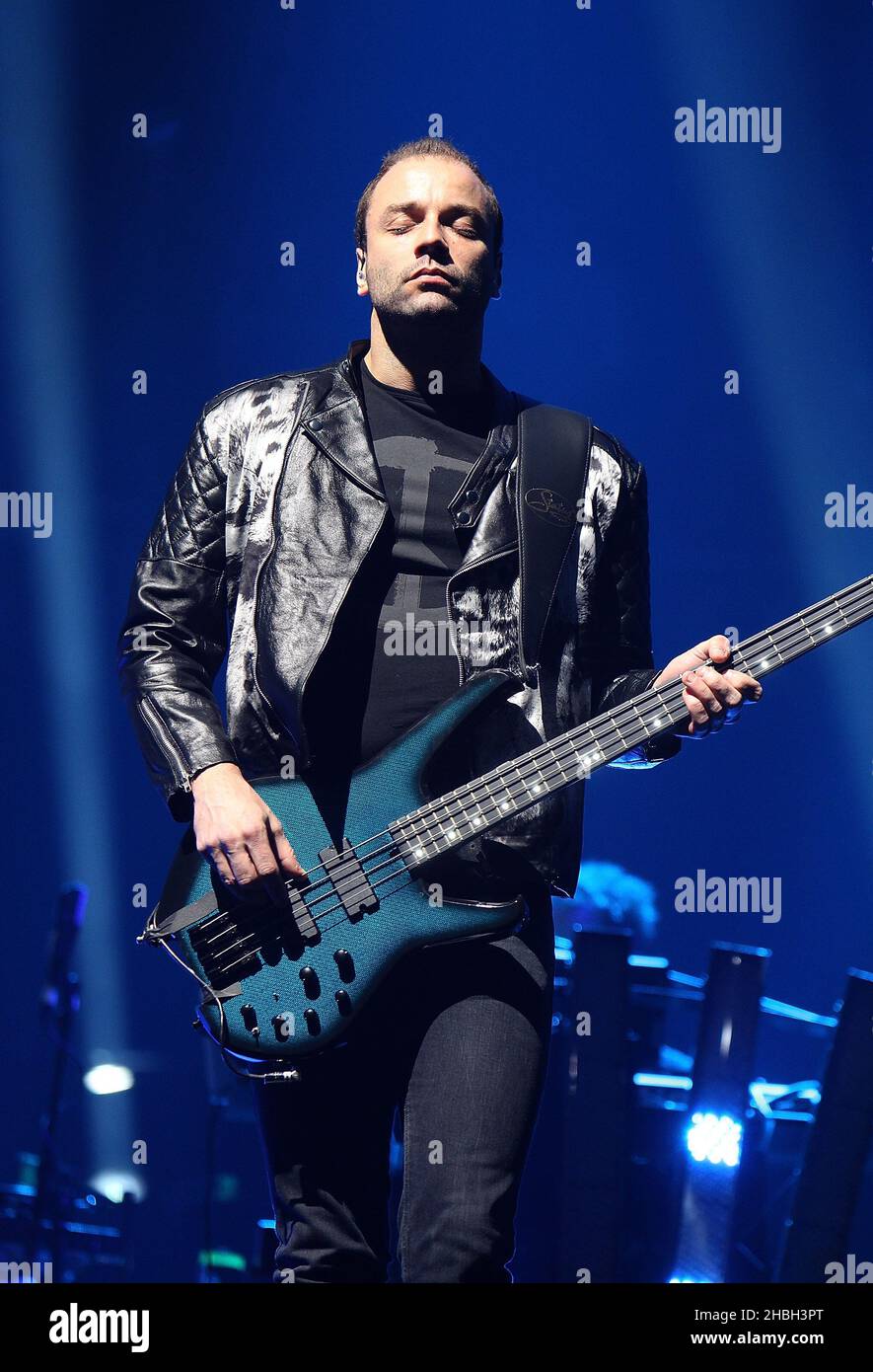 Christopher Wolstenholme of Muse performs on stage at the 02 Arena in  London Stock Photo - Alamy