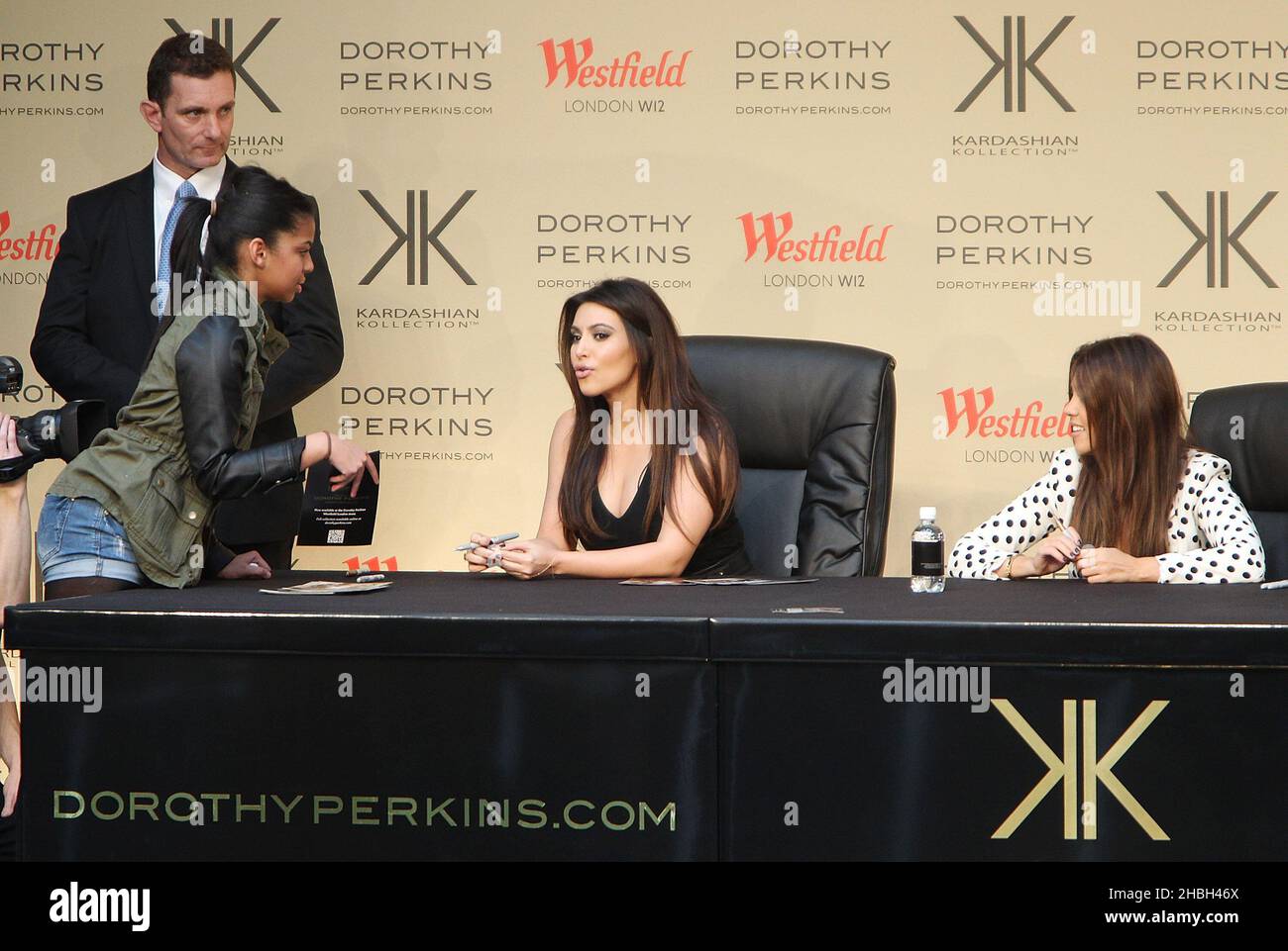 The Kardashian Sisters,Kourtney Kim and Khloe launch their Kardashian Kollection, (Available Exclusively at Dorothy Perkins) at Westfield White City in West London. Stock Photo