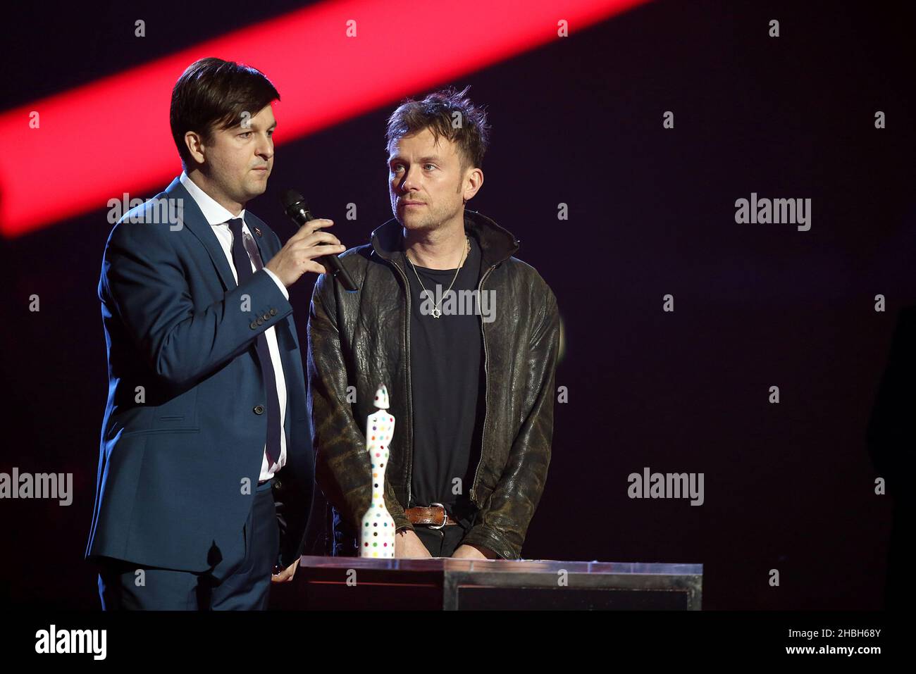 Ben Knowles and Damon Albarn accepting the Special Award for War Child ...