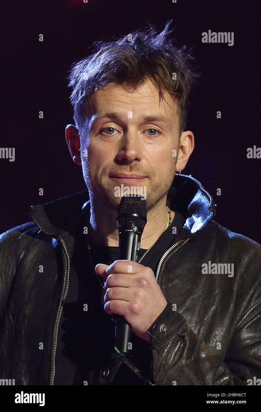 Damon Albarn accepting the Special Award for War Child from Ben Knowles ...