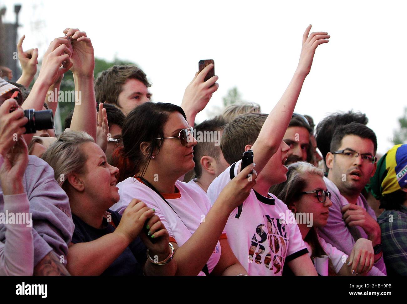 Crowd fans of Stone Roses watching their performance on stage at ...