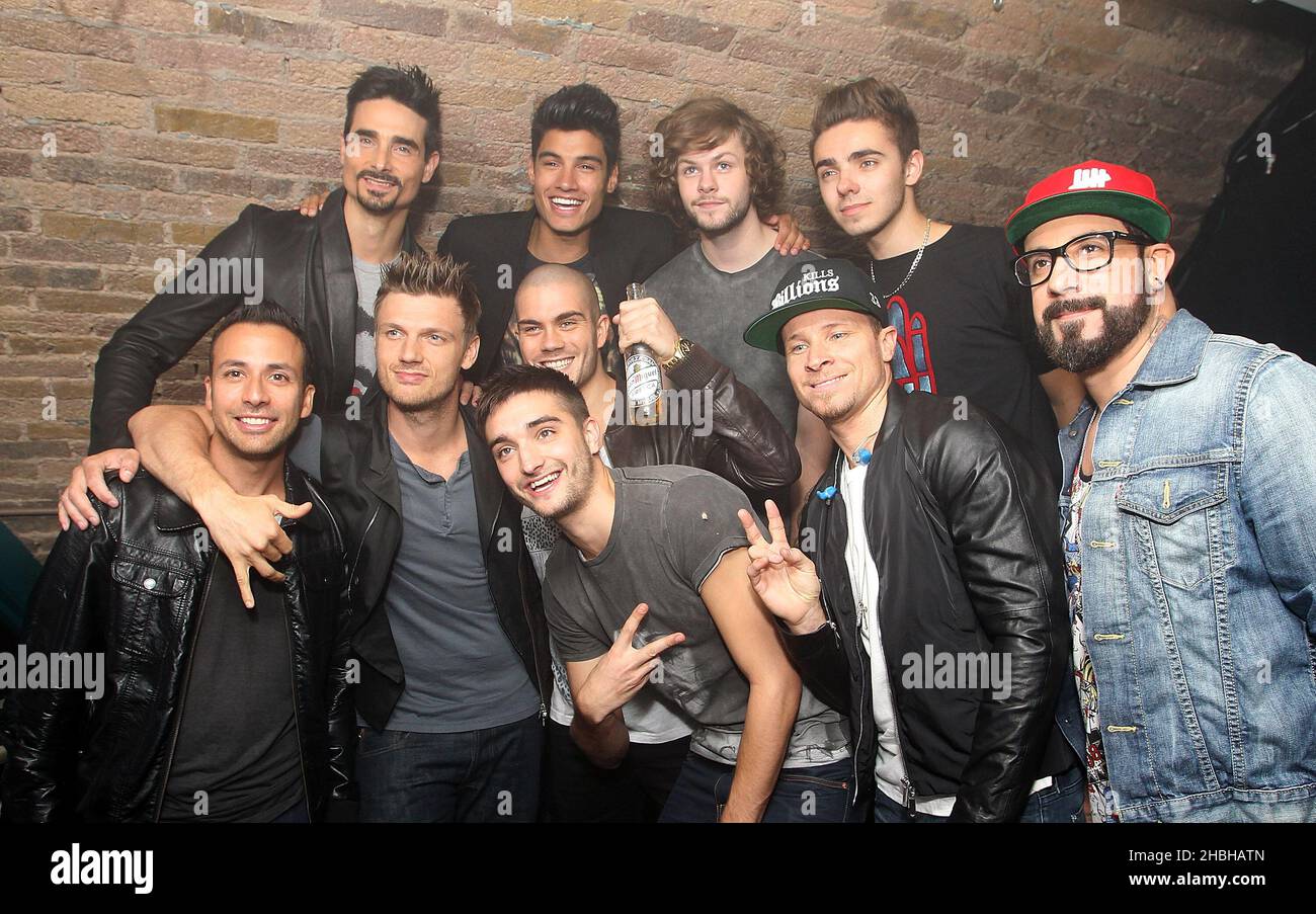 (L-R) Nick Carter, Howie Dorough, Kevin Richardson, AJ McLean and Brian Littrell of The Backstreet Boys posing backstage at G-A-Y Heaven in London. (L-R) Front Row, Howie Dorough, Nick Carter, Max George, Tom Parker, Brian Littrell, AJ McLean, Back Row, Kevin Richardson, Siva Kaneswaran, Jay McGuiness, and Nathan Sykes of The Wanted and The Backstreet Boys posing backstage at G-A-Y Heaven in London. Stock Photo