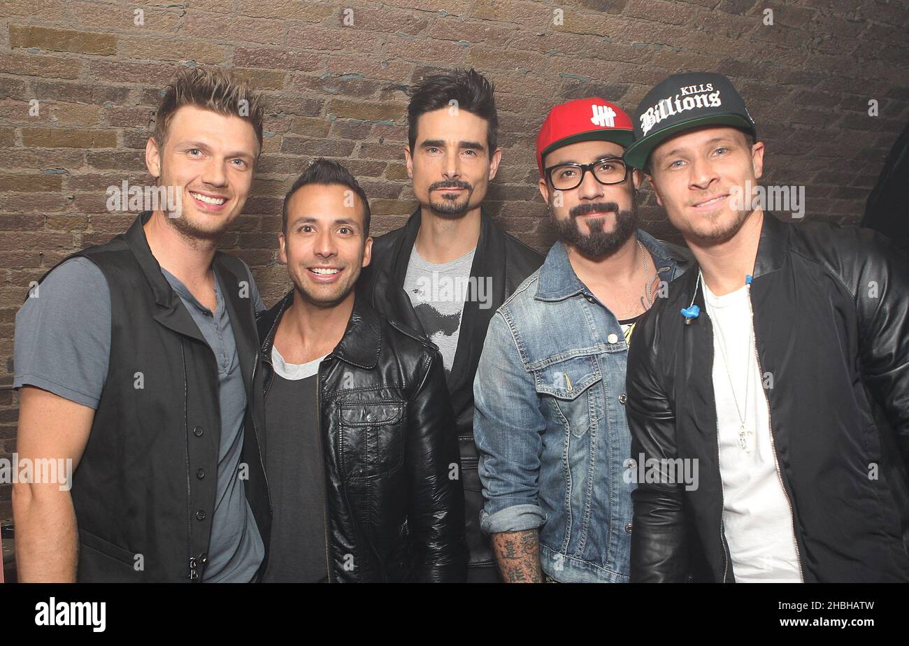 (L-R) (L-R) Nick Carter, Howie Dorough, Kevin Richardson, AJ McLean and Brian Littrell of The Backstreet Boys posing backstage at G-A-Y Heaven in London. Stock Photo