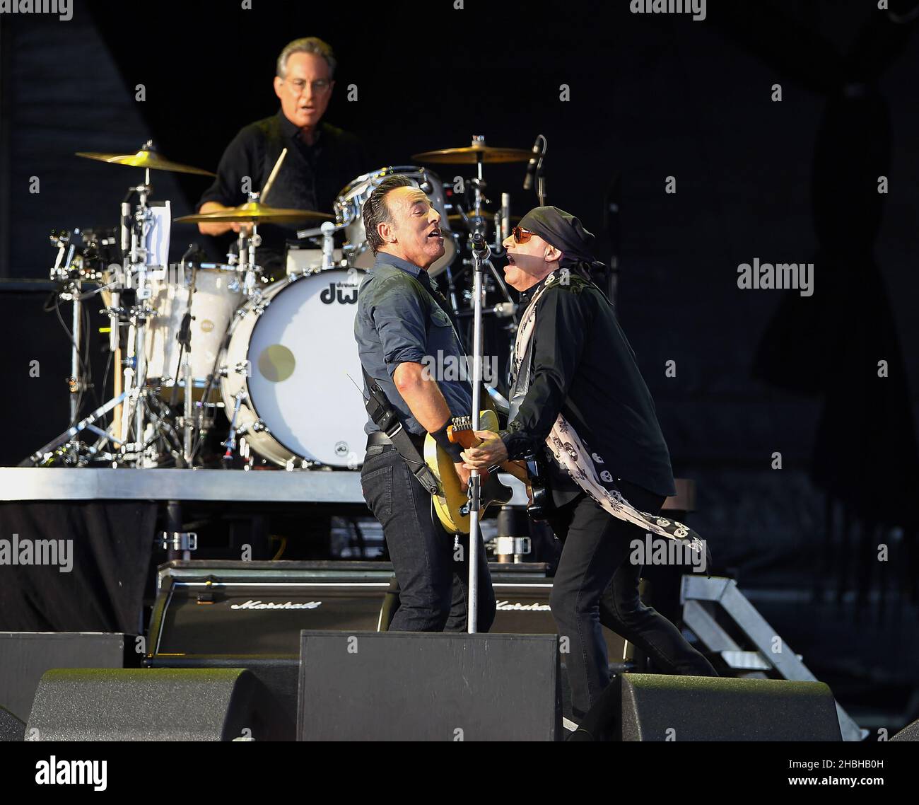 Headliner Bruce Springsteen performs alongside E Street Band guitarist Steven Van Zandt on stage during day 2 of Hard Rock Calling at Olympic Park, London Stock Photo