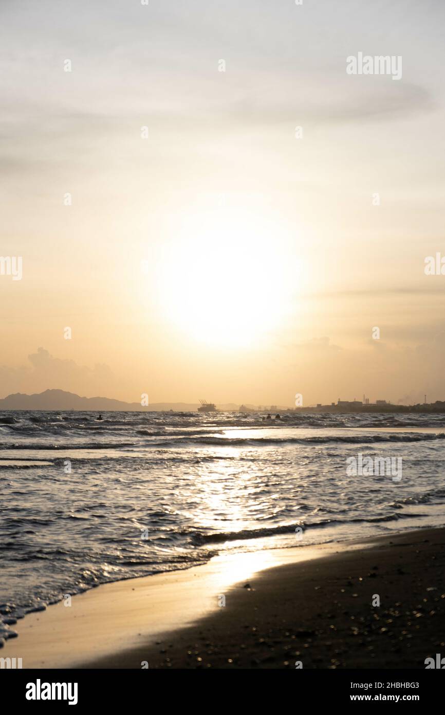 Waves hitting beach sunset shot hi-res stock photography and images - Alamy