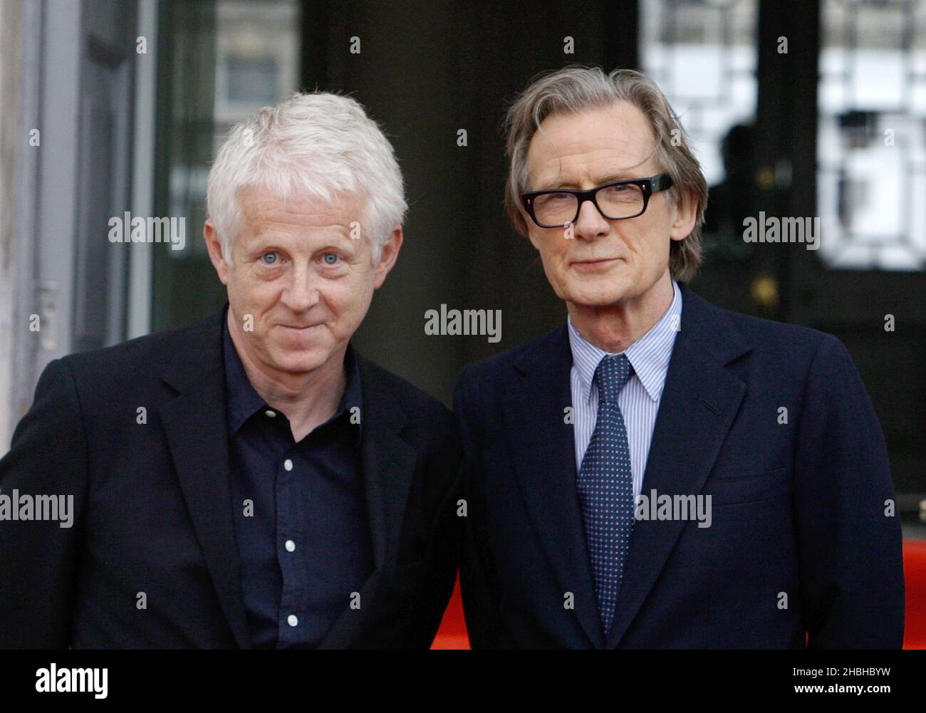 Richard Curtis and Bill Nighy (right) attending The World Premiere of About Time at Somerset House in London. Stock Photo