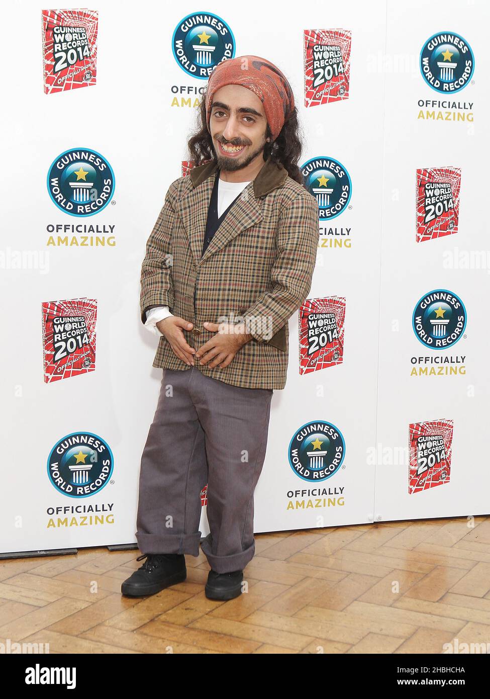 Imaan Hadchiti (shortest standup comedian) attends the Guinness Book of Records 2014 Launch Party at One Marylebone in London. Stock Photo