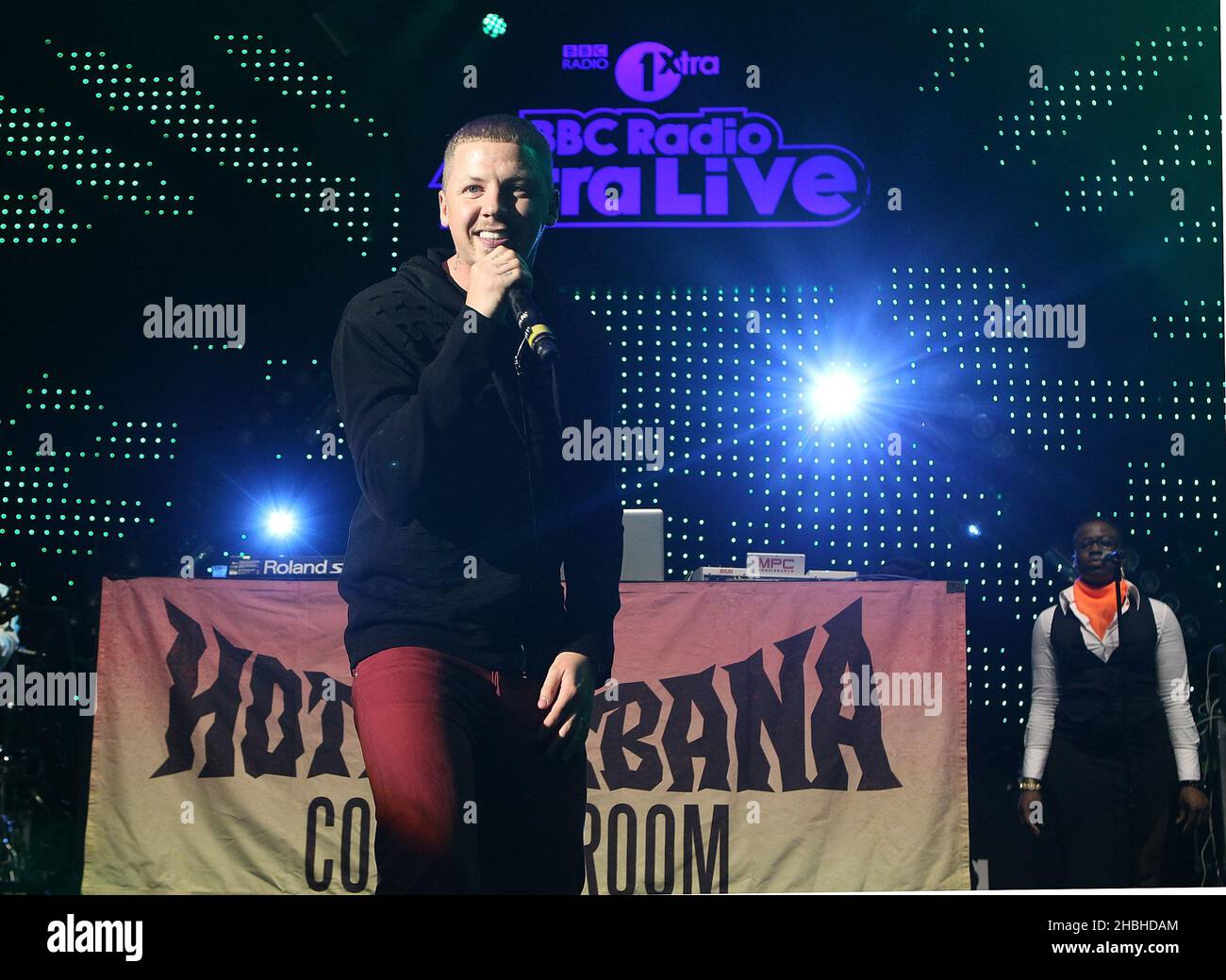 Professor Green performs on stage with Naughty Boy at BBC Radio