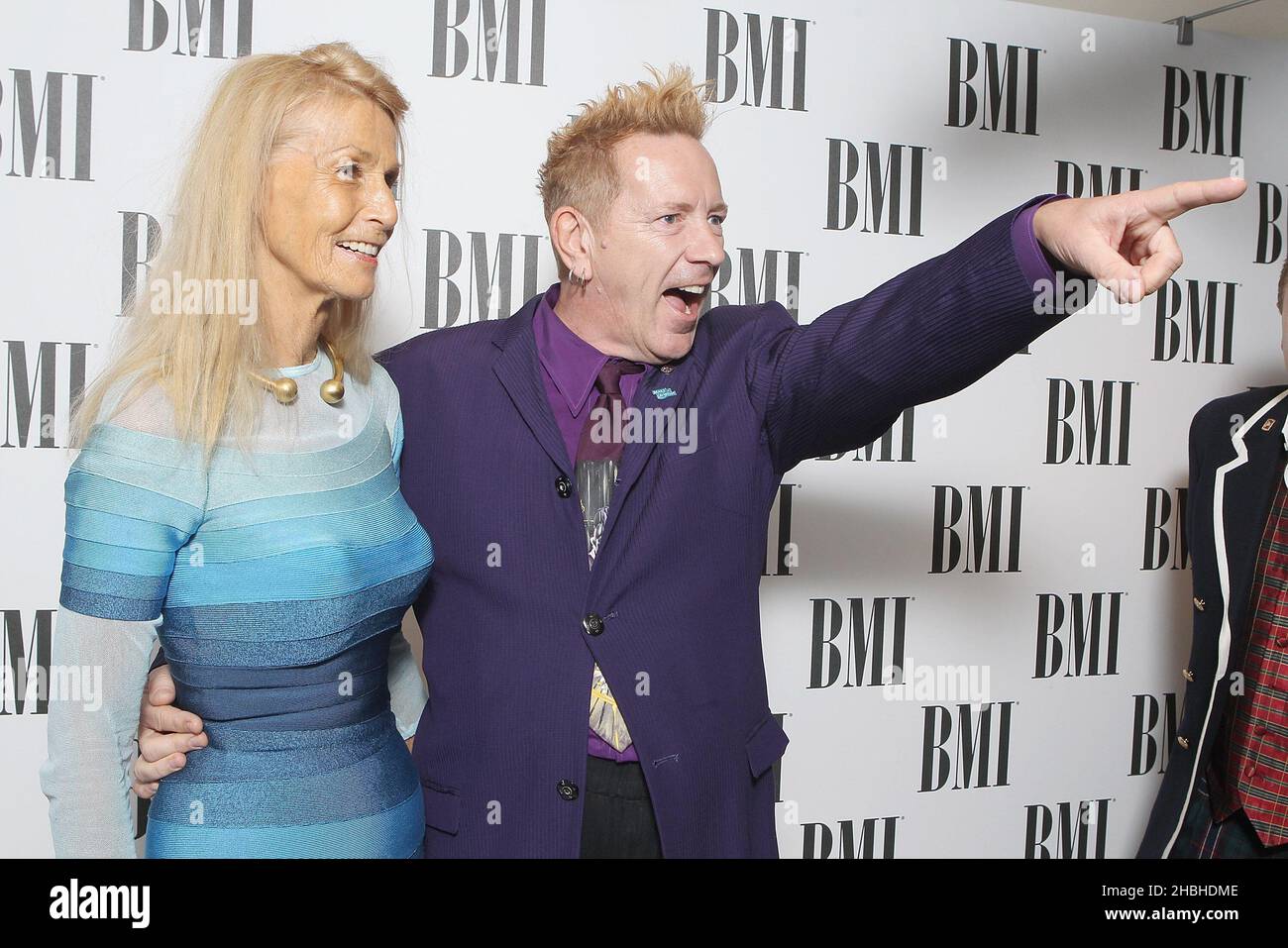 Johnny Lydon and wife Nora attend and wins the BMI Icon Award at the BMI Awards at the Dorchester in Central London. Stock Photo