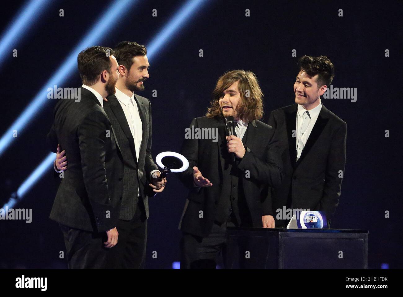 Bastille accept the award for Best Newcomer during the 2014 Brit Awards at the O2 Arena, London. Stock Photo