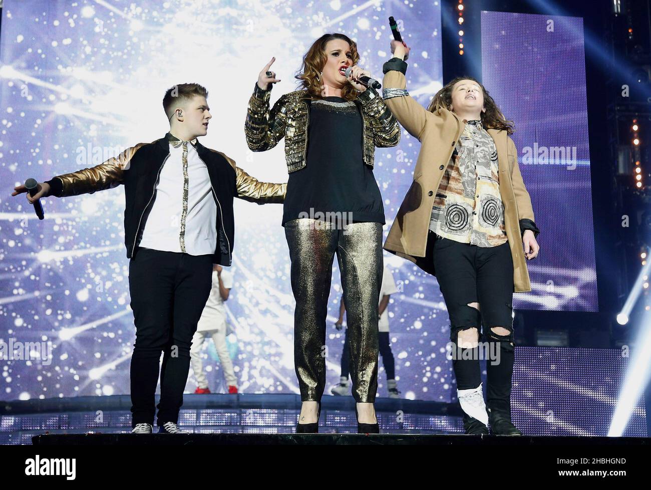 STRICTLY EDITORIAL USAGE RELATING TO THE TOUR AND NO USAGE AFTER 30 APRIL 2014.  Nicholas McDonald,Sam Bailey and Luke Friend  perform on stage at the X Factor 2014 Live Tour at the 02 Arena in London.  Stock Photo
