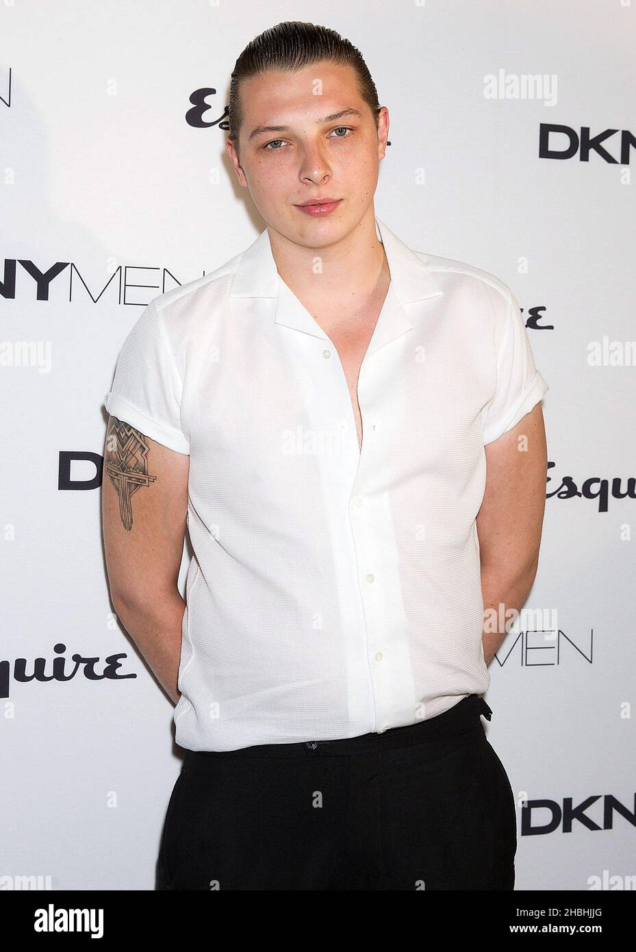 John Newman arrives at the DKNYMEN's debut London Collections Step and Repeat at One Embankment in London. Stock Photo