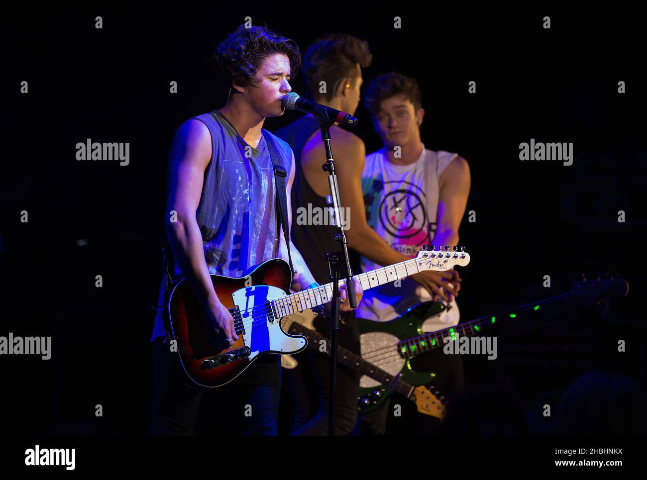 Bradley Simpson,James McVey and Tristan Evans of The Vamps perform at the Event Hammersmith Apollo in London. Stock Photo