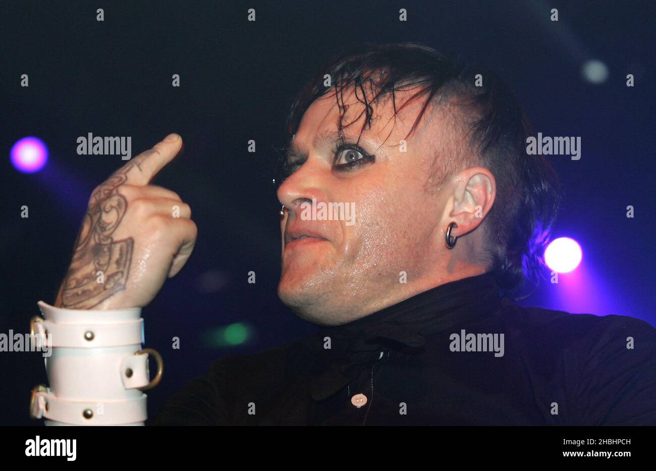 Keith Flint of The Prodigy performs on stage at their final concert of their UK tour promoting new album 'Their Law - The Singles 1990-2005', at the Carling Academy Brixton on December 1, 2005 in London. Stock Photo