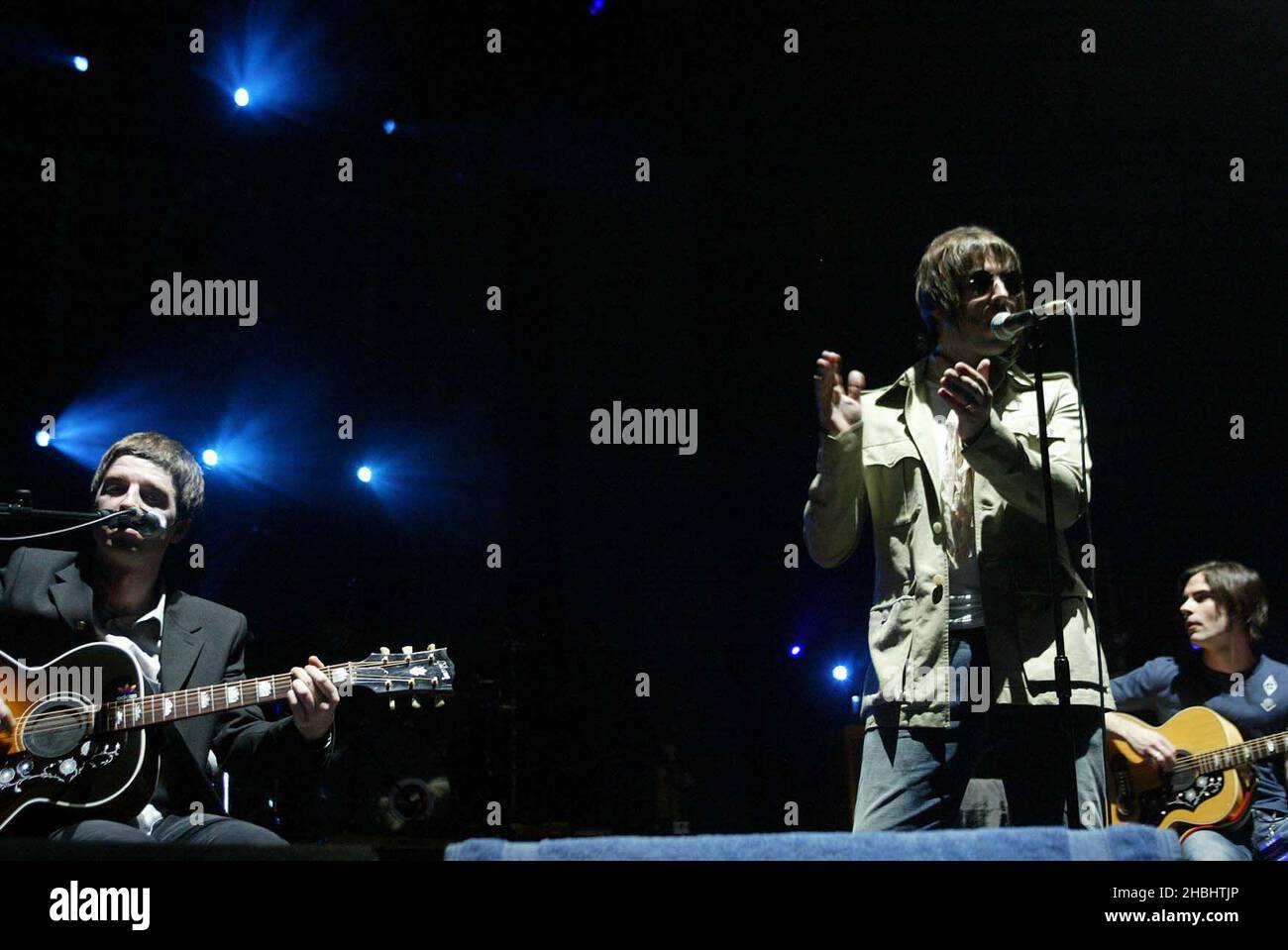 Liam and Noel Gallagher, Oasis performing live on stage at the Teenage