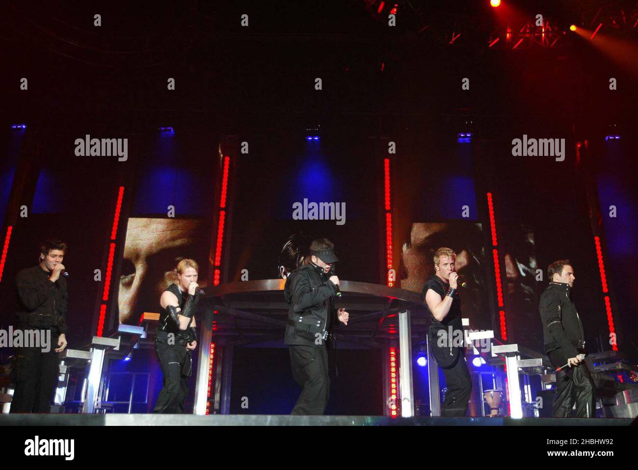 Westlife perform live at the London Arena. Full length. Stock Photo