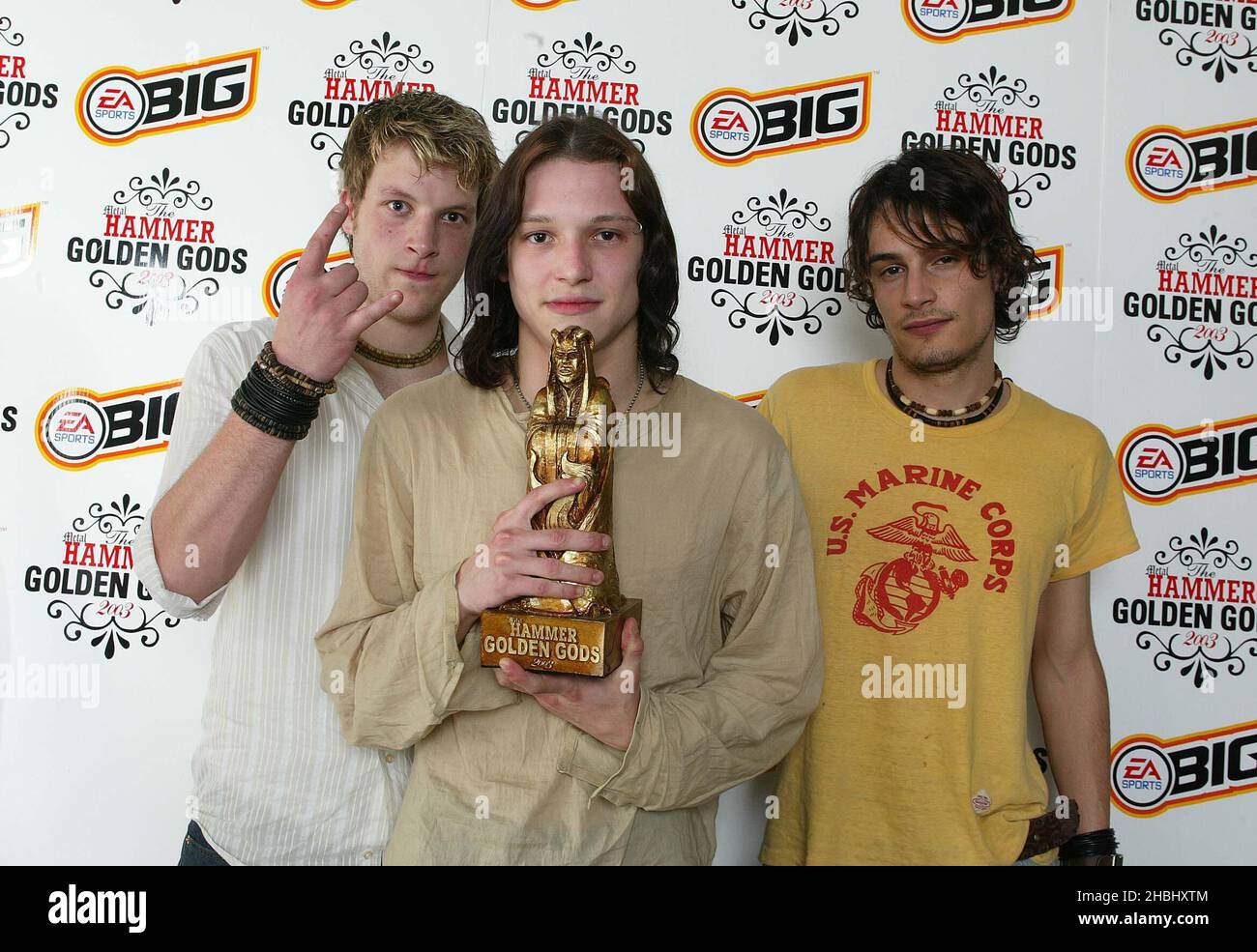 In Me posed group shot with award for Best British Band at the Metal Hammer Golden God Awards at the Kentish Town Forum London half length Stock Photo